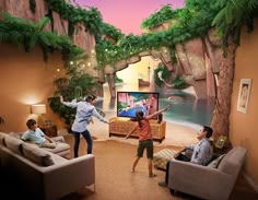 two men and a woman playing wii in a living room with palm trees on the wall