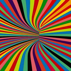 an image of a colorful background that looks like it is going through the center of a spiral