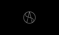 a black and white logo with the letter a in it's center, on a dark background