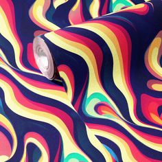 an image of a multicolored wallpaper with swirls and stripes on it