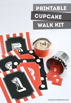 halloween cupcake walk kit with printables and candy wrappers on the table