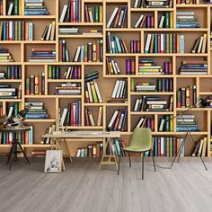 a bookshelf filled with lots of books next to a desk and chair in front of it