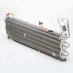 an aluminum radiator on a white background with wires attached to the radiator