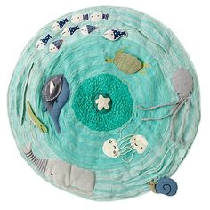 an ocean themed rug with sea animals and other marine creatures on the bottom of it