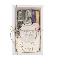 the purify and project box contains soaps, candles, and other items