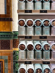 several shelves filled with different types of chocolates