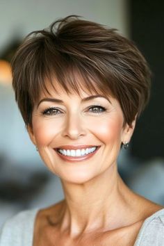 Save this pin for the best hairstyles for women over 60 with bangs. This textured pixie is perfect for women who want a low-maintenance style with plenty of personality. The choppy layers create volume, while the bangs add a soft touch. Razor Short Hair For Women, Haircuts For Over 60 Layered Bobs, Longer Pixie Haircut Older Women, Medium Pixie Haircut, Short Wavy Haircuts With Bangs, Pixie Hairstyles For Fine Hair, Short Hair For Older Women