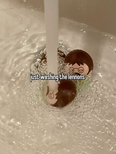 someone has just washed the lemons under the faucet