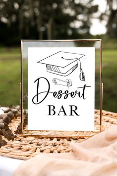 a dessert bar sign sitting on top of a table