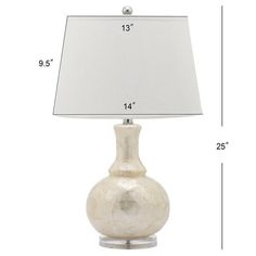 an image of a lamp with measurements for the base and lampshade on it