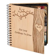 a wooden notebook with the words, out love continues to grow