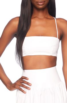 Elevate your night-out look in this shapely cotton-poplin crop top styled with slinky straps and a modern square neck. Square neck Spaghetti straps 100% cotton Machine wash, tumble dry Made in the USA of imported fabric Summer Spaghetti Straps Crop Top For Night Out, Chic Bandeau Tube Top With Adjustable Straps, Elegant Bandeau Crop Top For Summer, Chic Strapless Crop Top Bra Friendly, Party Crop Top With Adjustable Straps, Seamless Crop Top For Spring Night Out, Chic Bandeau Tube Top With Straps, Bandeau Crop Top With Removable Bra Pads For Party, Summer Stretch Tube Top With Removable Bra Pads