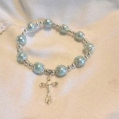 Exquisite Ladies' Charming Stretch Faux Pearl Beads Cross Bracelet Color: Please See Picture Length: About 7 Plus Stretch Items Condition: 100% Brand New!! A Perfect Gift For A Special Person, A Friend Or For Yourself! I Am Completely And Madly In Love With Making Jewelry! I Have Eclectic Tastes, And Love Simple, Dainty And Delicate Pieces Of Jewelry That Can Be Worn Every Day. Creating Custom Pieces Is Always Challenging And Rewarding, So Please Do Feel Free To Contact Me With Any Custom Silver Beaded Pearl Stretch Bracelet, Silver Pearl Bracelets With 8mm Beads, Pearl Beaded Rosary Bracelet With Round Beads, Adjustable Silver Beaded Rosary Bracelet, Knot Bangle, Love Simple, Beaded Leather Bracelet, Slide Bracelet, Gold Bracelet Set