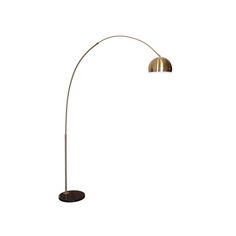 a floor lamp that is on top of a white wall and has a metal base