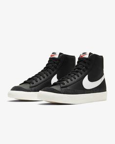 NEW MEN NIKE BLAZER MID '77 VINTAGE BASKETBALL SHOES MEDIUM COLOR: BLACK - WHITE - SILVER LEATHER - SYNTHETIC SIZES 8 - 8.5 - 9 - 9.5 - 10 - 10.5 - 11 - 12 - 13 SKU # DM1124 002 DESCRIPTION: VINTAGE STYLE. In the ‘70s, Nike was the new shoe on the block. So new in fact, we were still breaking into the basketball scene and testing prototypes on the feet of our local team. Of course, the design improved over the years, but the name stuck. The Nike Blazer Mid ’77 Vintage—classic since the beginning. Benefits Leather and synthetic upper keeps the classic look of the original while adding comfort and support. Vintage treatment on the midsole provides an old-school look. Autoclave construction fuses the outsole to the midsole for a streamlined look that echoes the ‘70s design. Exposed foam on th Blazer Mid 77 Vintage, Nike Casual, Basket Vintage, Nike Blazer Mid 77, Nike Blazer Mid, Black Leather Sneakers, Black And White Shoes, Nike Blazers Mid, Vintage Sneakers