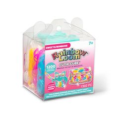 a package of rainbow loom bracelets in a clear plastic box on a white background