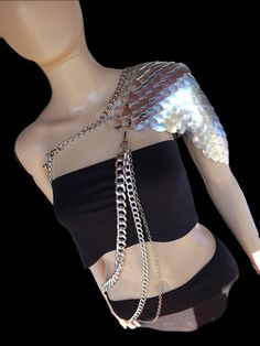 This bold brushed silver scalemail armor and chainmail body chain shoulder armor is perfect for any snake, fairy, mermaid, or dragon cosplay or viking costume, or for Renaissance Fair,  outfits, weddings, or music festivals or concert outfits. With adjustable neck and back straps, you'll be ready to conquer whatever adventure you choose. THIS IS NO ORDINARY SCALEMAIL TOP! IT IS PREMIUM CHAINMAIL CRAFTED BY A SKILLED ARTISAN IN CANADA! Fashioned from top-grade stainless steel rings and chains and Armor Dresses, Dragon Shrek, Alyssa Velaryon, Scalemail Armor, Snake Clothes, Dress Festival Outfit, Dragon Cosplay, Outfit Corset, Chainmail Armor