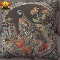 a decorative pillow with a bird on it