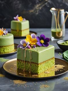 there is a piece of cake with flowers on the top and one slice has green frosting