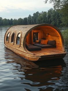 a wooden boat floating on top of a body of water