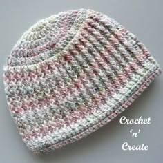 a crochet hat is shown on a table with the words coach'n create written below it