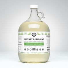 a bottle of laundry deterant on a white background