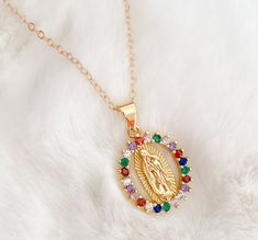 Our lady of Guadalupe necklace MATERIAL AND SIZE 18k gold plated medal 18k gold filled cable chain Cubic zirconia Size pendant: 1.5cm Length chain: 45cm If you have questions about the product, feel free to reach me out. Don't forget to check out my other items in the store: Https://www.etsy.com/shop/nyahwithlove Modest Jewelry, Lady Of Guadalupe Necklace, 1970s Costume, Guadalupe Necklace, Black Cross Necklace, Quinceanera Jewelry, Jewelry Mexican, London Topaz, Virgin Mary Necklace