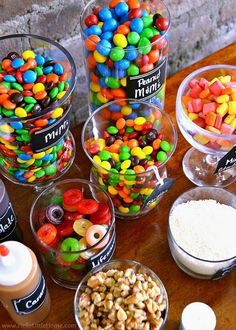 there are many different types of candy in bowls