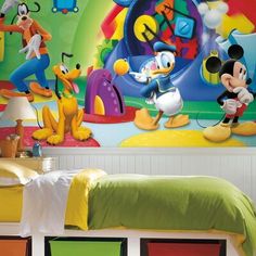 mickey mouse wall mural in a child's bedroom