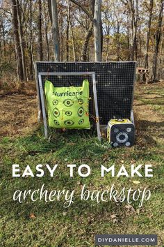 an easy to make archery backpack sits on the ground in front of some trees and grass