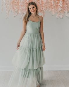 Some dresses are just made for beautiful destinations. The Wendy dress is just that with soft tulle and a beautiful tie back for a look that is dramatic yet down to earth. This is the women's version in mint, made to match with the girl's Wendy, Juliet and Fawn dresses in separate listings. Summer Bridesmaid Dress With Flowy Skirt, Sleeveless Sage Dresses For Spring, Sage Sleeveless Dresses For Spring, Chic Sage Dress For Spring, Elegant Sage Dress For Summer, Elegant Sage Summer Dress, Green Summer Maxi Dress For Bridesmaids, Green Maxi Dress For Summer Bridesmaid, Green Summer Bridesmaid Maxi Dress