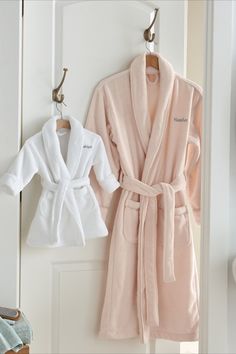 A simple way to turn any day into a spa day. Thick and plush, this robe envelops the wearer in luxurious warmth and comfort. The baby robe features the same quality (in miniature), so you can both feel extra pampered. White Cozy Sleep Robe, Cozy White Robe For Relaxation, Cozy White Sleep Robe, White Long Sleeve Bathrobe, White Long Sleeve Bath Robe, White Long Sleeve Relaxation Robe, White Long Sleeve Robe For Relaxation, White Long Sleeve Home Robe, Dad Gojo