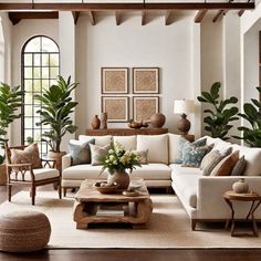 a living room filled with lots of furniture and plants on top of a wooden table