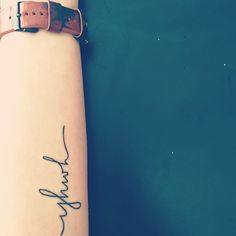 a woman's arm with a tattoo that says faith on the side of her arm