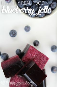 blueberry jello on a plate with berries around it