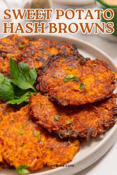 sweet potato hash browns on a white plate with parsley sprinkled on top