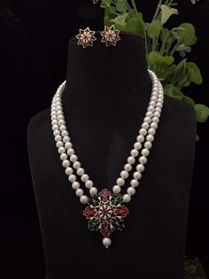 Gorgeous Long CZ Stones Necklace with Pearl in Victorian style with matching earrings Necklace length: 22 inches approx  Highest quality and craftsmanship Free shipping Since natural semiprecious beads are used in this necklace, Color and shape of the beads may vary slightly Please let me know if you have any questions Indian Long Necklace, Cz Stone Necklace, Long Necklace Set, Rani Haar, Victorian Necklace, Real Pearl Necklace, Stones Necklace, Real Pearls, Stone Pendant