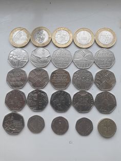 a bunch of different types of foreign coins