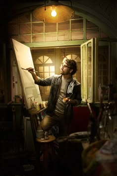 a man is painting on an easel in the dark with light coming from his window