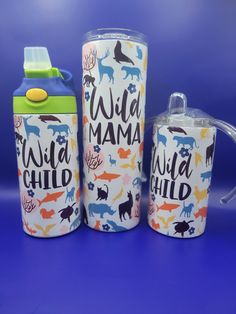 three different types of cups with lids and handles on them, one has a lid that says wild mama