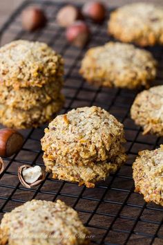 several cookies on a cooling rack with nuts