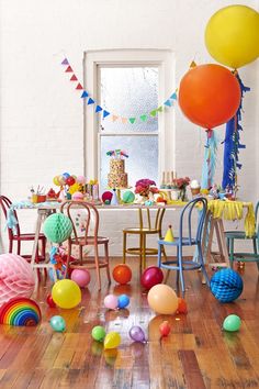 an image of a table with balloons on it