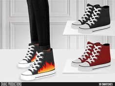 four pairs of shoes with flames painted on them, all in different colors and sizes