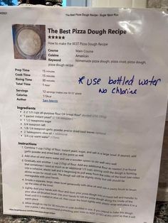 the best pizza dough recipe is written in blue ink on a white piece of paper