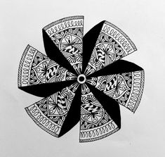 a black and white drawing of a flower with an intricate design on it's petals