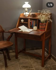 Brown table, computer table, closes with a flap, lamp, book Antique Furniture With Modern Decor, Desk Next To Bookshelf, Study Desk Vintage, Dinning Room Table As Desk, Diy Vintage Desk, Writing Table Design, Secretary Desk In Living Room, Living Room Desk Ideas, Wooden Desk Aesthetic