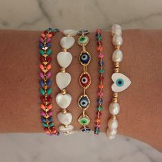 Handmade bracelet. Nacre heart beads. Length: 6" plus 2" extender chain. Made in USA. Evil Eye Design, Eye Design, Evil Eye Necklace, Timeless Accessories, Evil Eye Bracelet, Handmade Bracelet, Heartfelt Gifts, Colorful Bracelets, Heart Beads