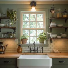 a kitchen sink sitting under a window in front of shelves filled with pots and pans