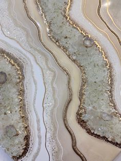 "An original, handmade, Ivory white and Champagne gold resin geode wall art, perfect as luxury wall decor and unique gifts. A beautiful epoxy resin art piece for modern style home that create a unique decor for any room. Stunning one of a kind geode painting in tones of Ivory, pearl white, champagne and gold undertone. The Epoxy resin painting measures 22X30\" and is handmade on gallery style wooden panel of depth 1-1.5 inches. Made with high quality pigments, glitters, glass crystals, real quar Diy Resin Painting, Decorated Mirrors, Epoxy Resin Wall Art, Resin Geode Wall Art, Resin Floors, Crystal Wall Art, Resin Canvas, Epoxy Resin Wall, Geode Painting