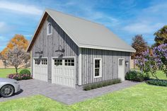 a car is parked in front of a two - story garage with a loft on the roof